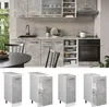 A modern kitchen with grey marble-effect cabinets, a black sink and faucet, and a dining table with chairs. Produktbild-Vorschau