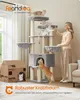 A woman is interacting with a multi-level cat tree that has several cats on it. Produktbild-Vorschau