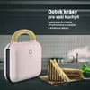 A pink sandwich maker with a wooden handle is displayed on a dark surface, with a sandwich next to it in a kitchen setting. Náhled obrázku produktu