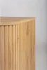 A close-up of a wooden cabinet with vertical fluting. Voir les images du produit
