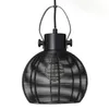 A black pendant light with a wire cage shade. Produktbild-Vorschau
