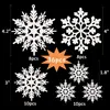 A collection of white glitter snowflakes of various sizes arranged on a black background, with size and quantity indicators. Produktbild-Vorschau