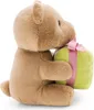 A plush teddy bear sitting and holding a gift. Produktbild-Vorschau