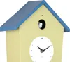 A close-up view of a cuckoo clock shaped like a house, with a yellow body and a blue roof. Produktbild-Vorschau