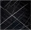 A close-up of a black surface with white veining, resembling marble or concrete. Anteprima dell’immagine prodotto