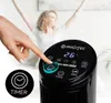 A woman stretching in bed with a close-up of a black tower fan's control panel. Anteprima dell’immagine prodotto