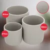 Three ceramic pots of different sizes are displayed, with red circles indicating their diameters. Anteprima dell’immagine prodotto