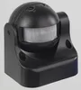 A black motion detector sensor with a PIR lens, mounted on a black base. Produktbild-Vorschau