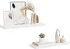 Two white floating shelves are displayed against a white background, each decorated with various decorative items. Produktbild-Vorschau
