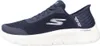 A side view of a navy blue Skechers Go Walk sneaker with a white sole. Anteprima dell’immagine prodotto