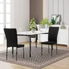 A dining room scene with a table and chairs. Produktbild-Vorschau