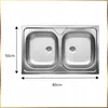 A top-down view of a double-basin stainless steel kitchen sink with dimensions indicated. Produktbild-Vorschau