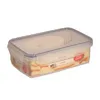 A clear, well-lit product shot of a rectangular food storage container with a clear lid and blue trim, filled with sliced food items. Produktbild-Vorschau
