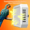 A parrot is shown next to a white heating device, with yellow arrows indicating heat flow. Produktbild-Vorschau