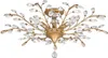 A close-up, studio shot of a gold-colored ceiling light fixture with clear crystal accents. Produktbild-Vorschau