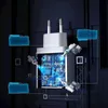 A diagram illustrating the internal components of a white USB wall charger, with robotic arms and blue glowing elements. Anteprima dell’immagine prodotto