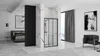 A modern bedroom and bathroom suite with a shower enclosure, bed, and seating area. Anteprima dell’immagine prodotto