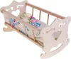 A wooden doll's cradle with bedding. Náhľad obrázku produktu