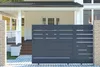 A modern sliding gate in front of a house entrance. Produktbild-Vorschau