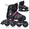 A pair of black and pink inline skates and ice skates. Anteprima dell’immagine prodotto