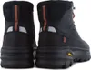 Rear view of two black winter boots. Produktbild-Vorschau