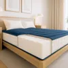 A cutaway view of a mattress on a bed, showing its internal layers and construction. Náhľad obrázku produktu