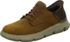 A single brown Skechers men's sneaker is shown from a diagonal, slightly elevated front-side view against a white background. Voir les images du produit