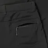 Schwarze Softshellhose für Damen von Mammut mit seitlicher Reißverschlusstasche. Produktbild-Vorschau