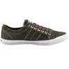 A side view of a single green sneaker on a white background. Voir les images du produit