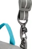 A close-up view of a bag strap and clasp. Produktbild-Vorschau
