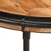 Close-up of the edge of a wooden table with a black metal rim and leg. Náhled obrázku produktu