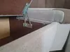 Close-up view of the internal mechanism and upholstery of a sofa or bench. Produktbild-Vorschau
