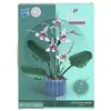 The image shows the packaging of a building block set for a potted orchid. Náhľad obrázku produktu
