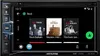 A car stereo system displaying a music app interface. Produktbild-Vorschau