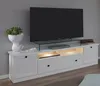 A white TV stand with a television on top and decorative items. Produktbild-Vorschau