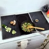 A kitchen scene with cooking ingredients and a stovetop. Produktbild-Vorschau