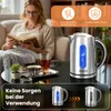 A woman is reading a book while a kettle is on a table with tea. Produktbild-Vorschau