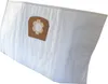 A white vacuum cleaner bag with a brown cardboard attachment. Produktbild-Vorschau