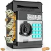 A digital piggy bank with a keypad and a slot for money. Náhled obrázku produktu