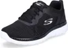 A black Skechers women's training shoe with a white sole, shown from the side. Anteprima dell’immagine prodotto