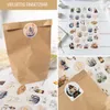 A collage of images showing brown paper bags with decorative stickers, and sheets of stickers with Ramadan-themed designs and numbers. Produktbild-Vorschau