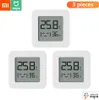 Three white digital thermometers are displayed against a white background. Náhled obrázku produktu