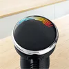 Close-up of the top of a black hand blender with a chrome ring and a light indicator showing 'Turbo' mode. Produktbild-Vorschau