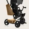 A close-up view of a black and brown Lionelo Kori tricycle, highlighting its features. Produktbild-Vorschau
