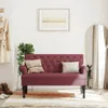 A burgundy bench with two pillows in a hallway setting, next to a coat rack and a mirror. Produktbild-Vorschau