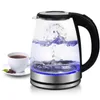 A glass electric kettle with boiling water and a cup of coffee next to it. Produktbild-Vorschau