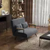 A living room scene with a sofa, bookshelf, and coffee table. Podgląd zdjęcia produktu