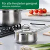 A kitchen scene with cookware and ingredients. Produktbild-Vorschau