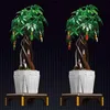 Two identical model money trees are displayed side-by-side against a dark grid background. Produktbild-Vorschau