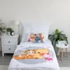 A child's bed with Winnie the Pooh themed bedding. Anteprima dell’immagine prodotto